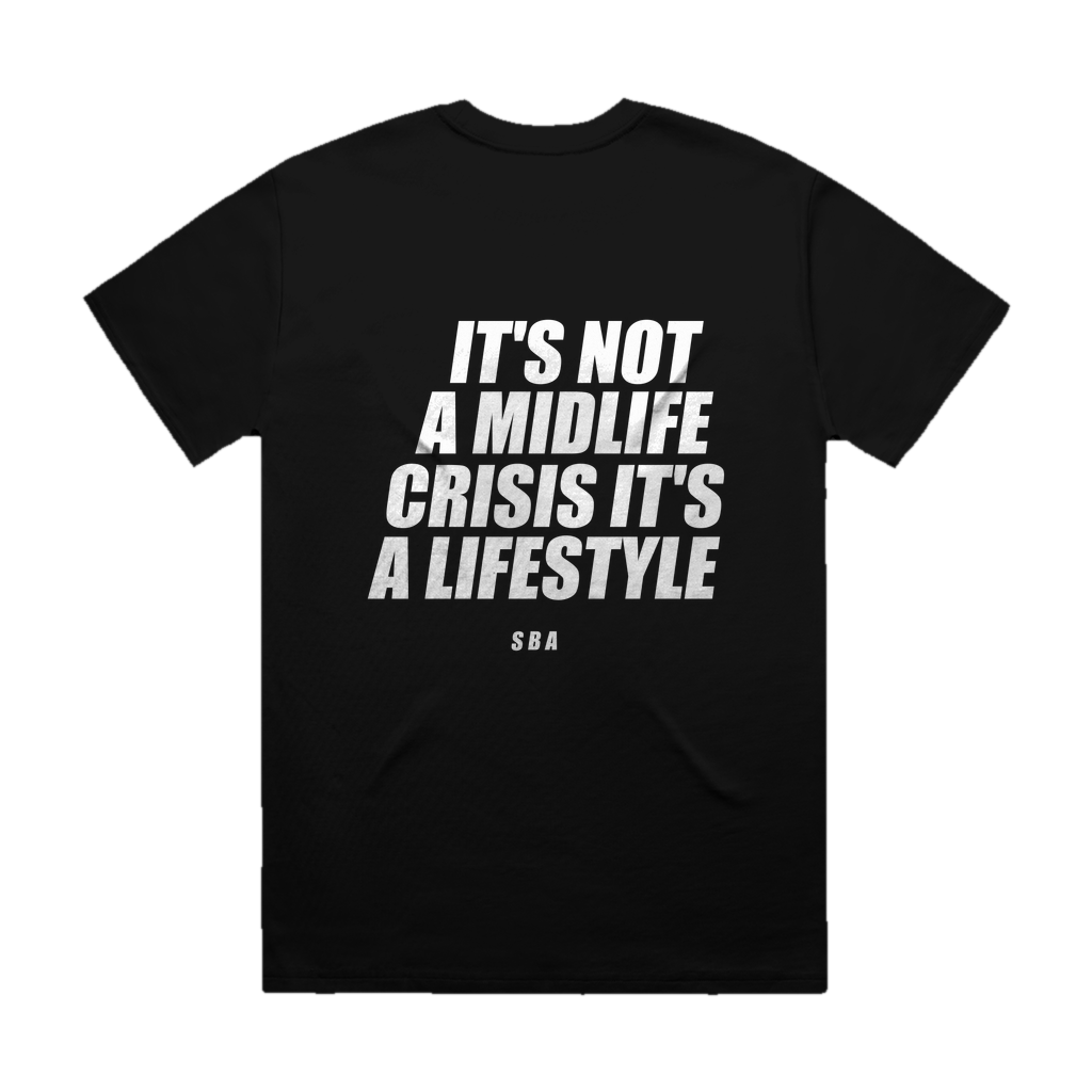 IT'S NOT A MIDLIFE CRISIS IT'S A LIFESTYLE printed in white across the back of a black heavyweight boxy tee. Street Bikes Addicts.