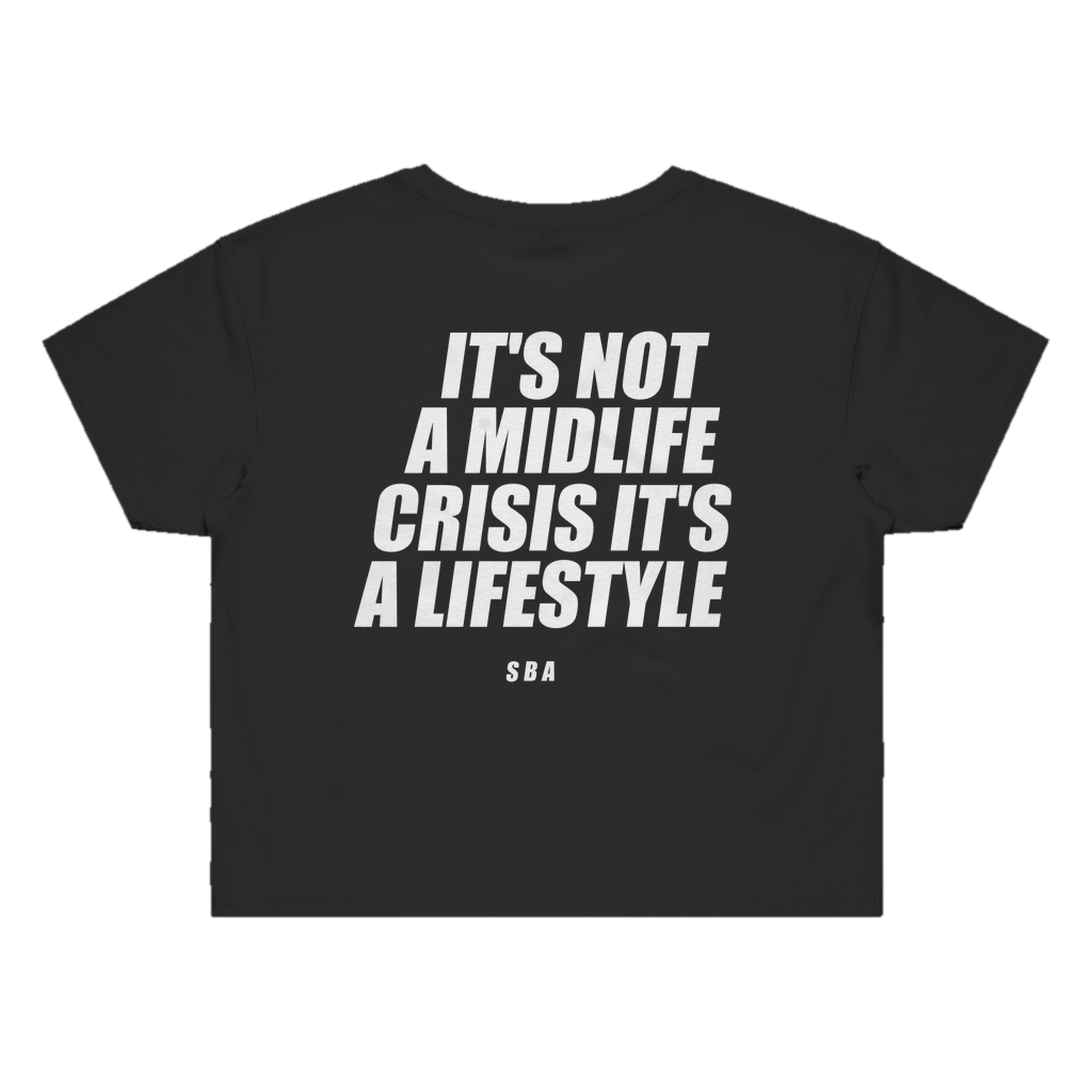 IT'S NOT A MIDLIFE CRISIS IT'S A LIFESTYLE printed in white across the back of a black womens crop tee. Street Bikes Addicts.