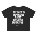 THERAPY IS EXPENSIVE BIKES ARE ALSO EXPENSIVE printed in white across the back of a black womens crop tee. Street Bikes Addicts.